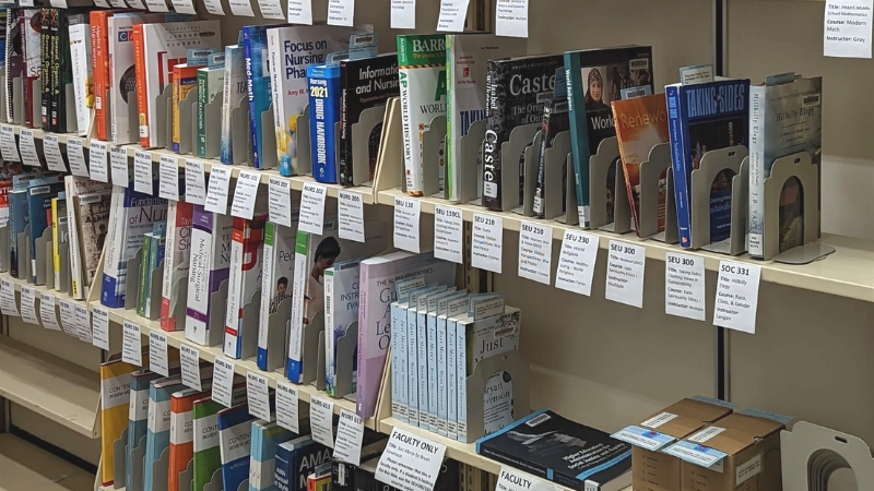 Image of Reserve books arranged neatly on bookshelf